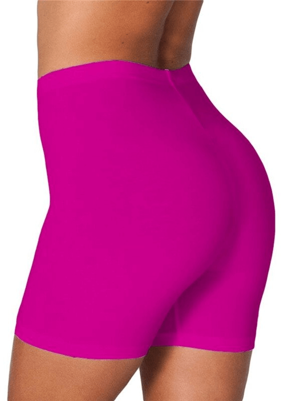 High-waisted slim elastic women's fitness shorts in vibrant pink, showcasing flexible fit and breathable design.